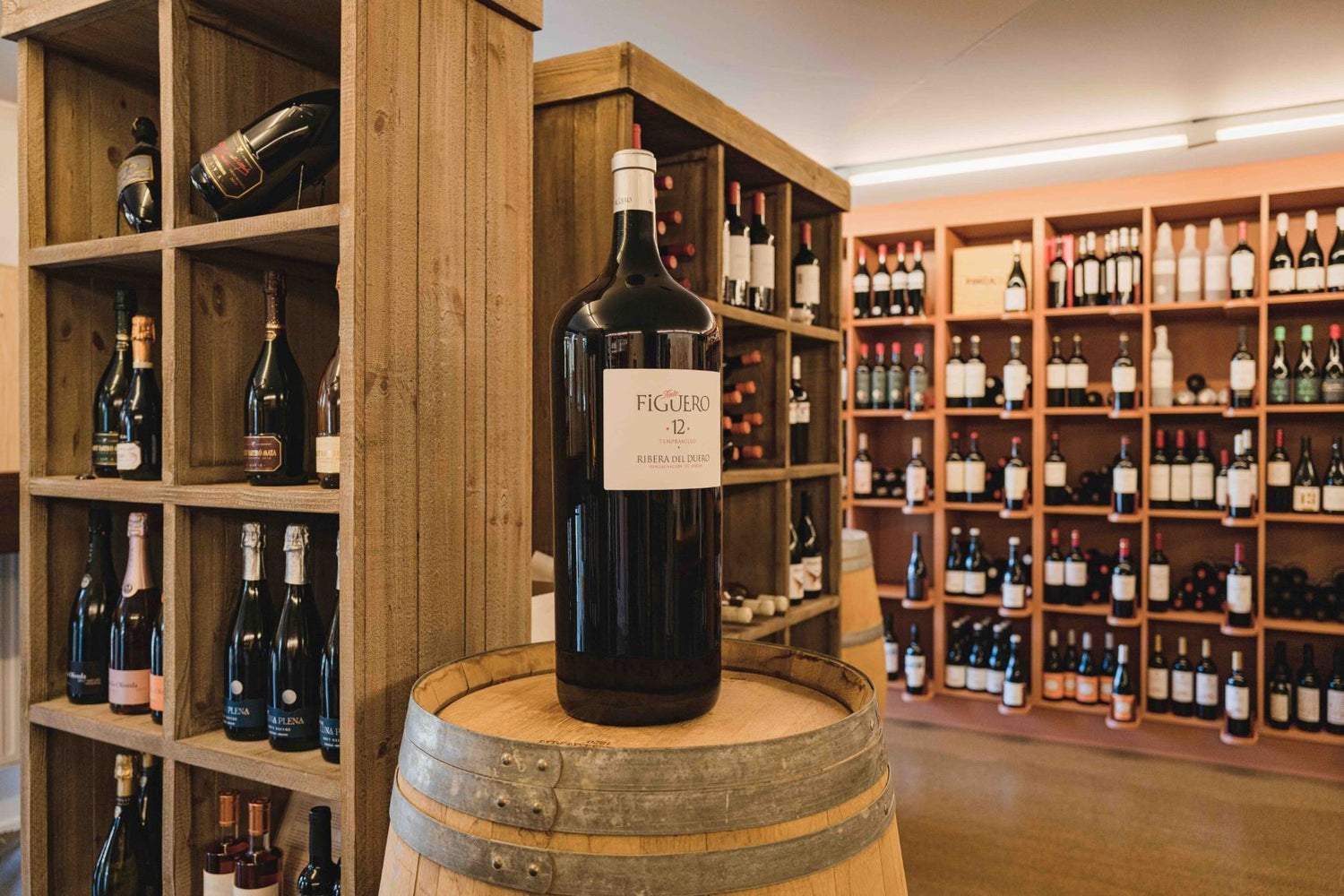 An image showing a 12 litre Figuero wine bottle displayed at Elvino
