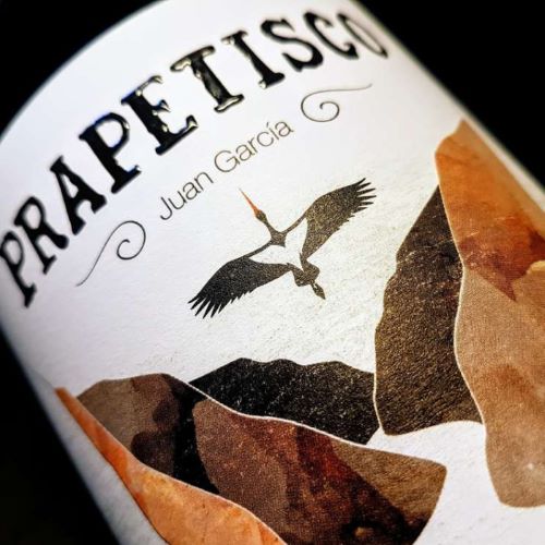 A red wine bottle called Prapetisco which originates from Castilla y Leon in Spain